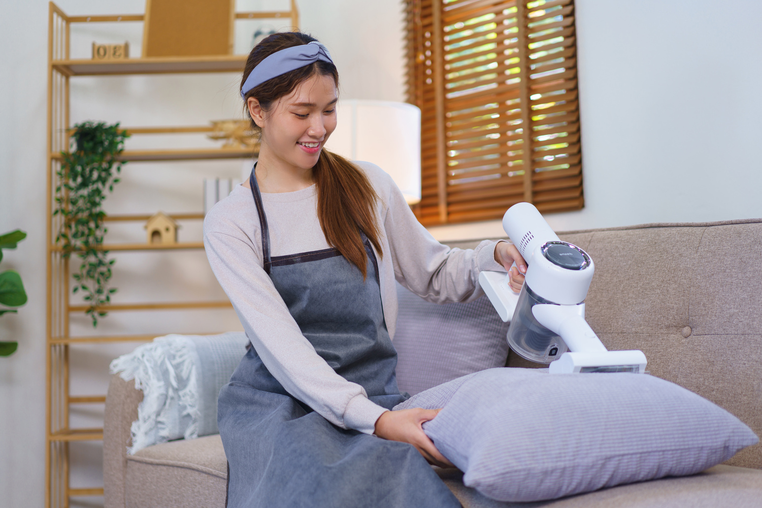 Housekeeping Concept, Housemaid Use Vacuum Cleaner to Vacuuming